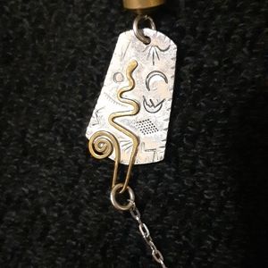 Long Silver and gold tones Aztec necklace